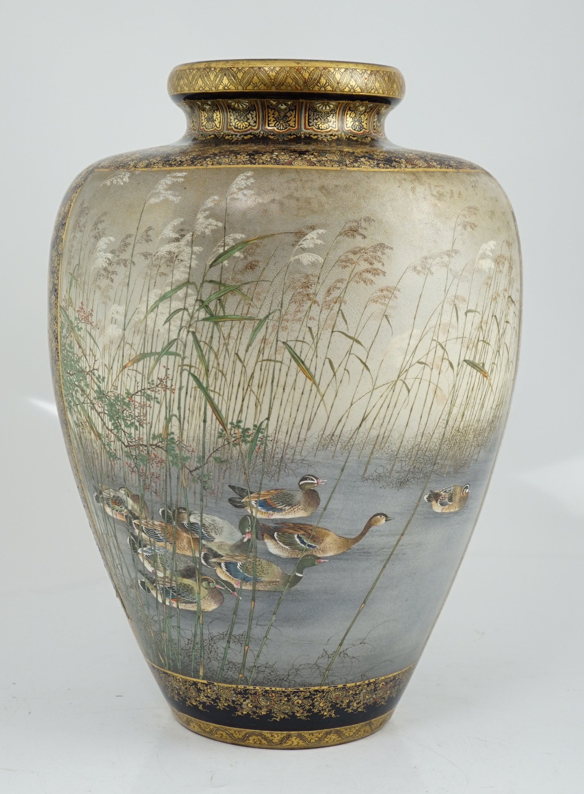 An exhibition size Japanese Satsuma pottery vase, by Kinkozan, Meiji period, star crack to one side